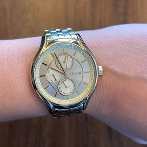 Women’s fossil stainless steel gold tone watch with diamonds